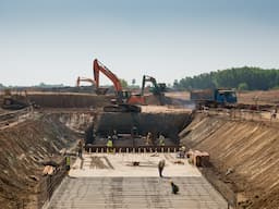 https://apprealty.asgard.estate/storage/images/1707223032_heavy_machines_and_construction_workers_working_on_a_building.jpg